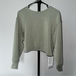 Twist back to front pullover